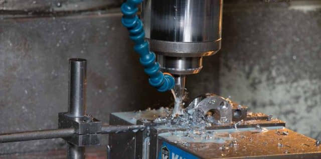 Machining small metal parts at Titletown Manufacturing